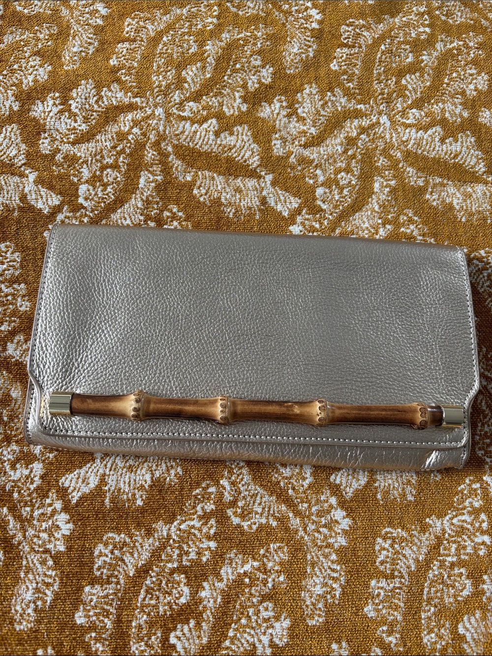 Lilly Pulitzer Gold clutch w/ bamboo accent, textured leather, 11x6.5”